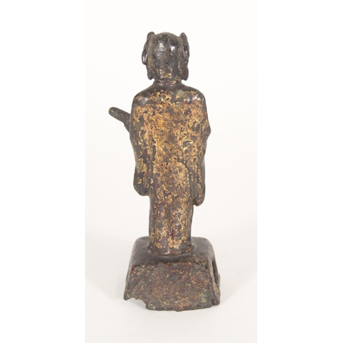 409 - Chinese bronze figurine of an offical holding a club, with partial gilt highlights, H15.5cm.