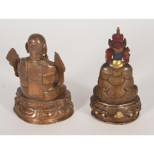 411 - Painted bronze figurine of a Boddhivista with gilt highlights and one other Buddha figure, max H11.5... 