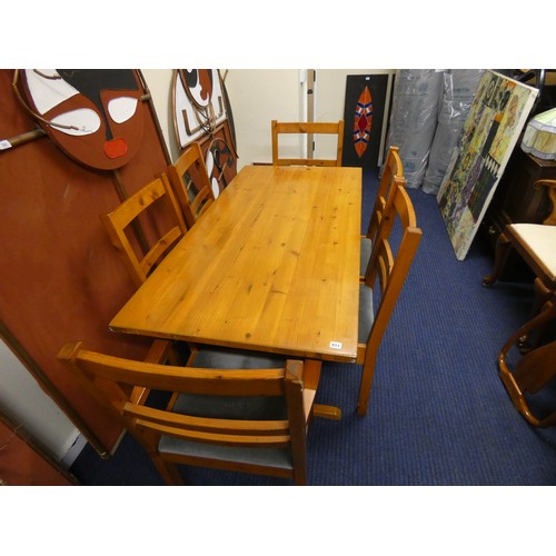 511 - Large pine table and six chairs.