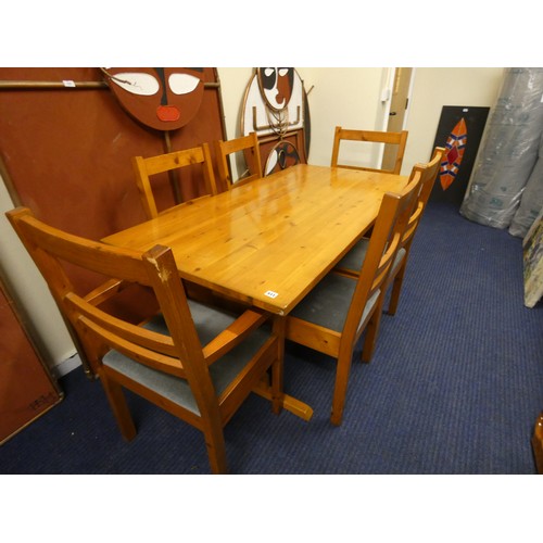 511 - Large pine table and six chairs.