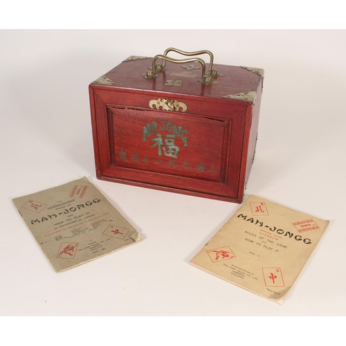 296 - Mah Jong set, early to mid 20th century, the wooden and metal bound case with five drawers of bamboo... 