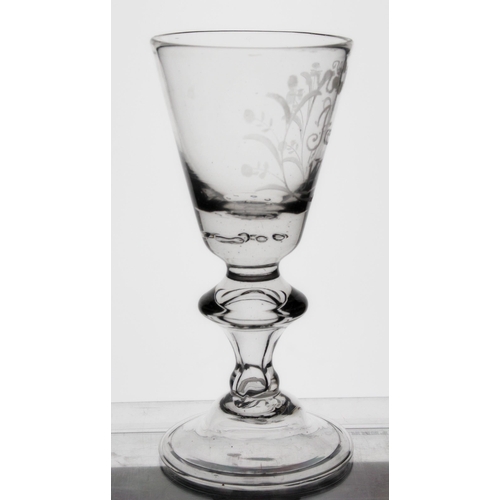 304 - George II baluster wine glass, the round funnel bowl engraved J.N. 1749 within floral frame, the bow... 