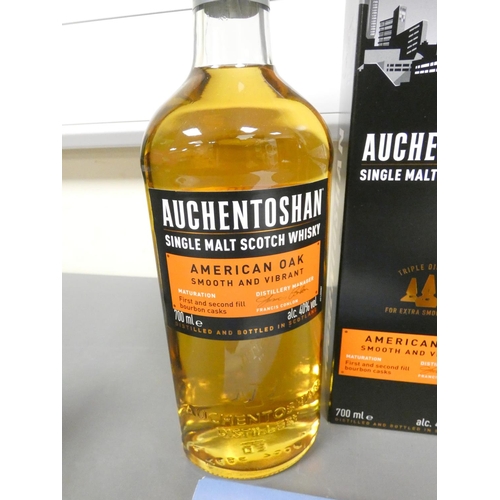 20 - Auchentoshan lowland American oak single malt scotch whisky, 70cl, 40% vol, and another, with a Tali... 