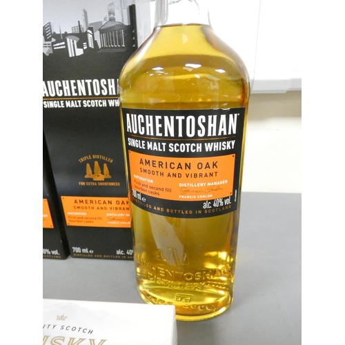 20 - Auchentoshan lowland American oak single malt scotch whisky, 70cl, 40% vol, and another, with a Tali... 