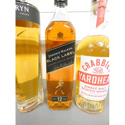 23 - Crabbie's Yardhead single malt scotch whisky 70cl 40% vol, Johnnie Walker 12 years old Black Label b... 