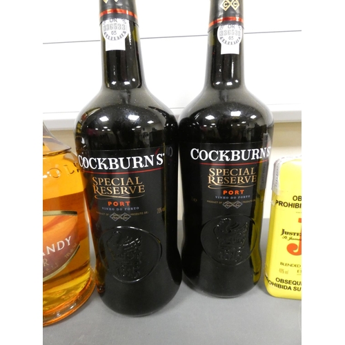 28 - Group of mixed alcohol to include two bottles of Cockburn's Special Reserve Port 1L 20% ABV, Bols Ap... 