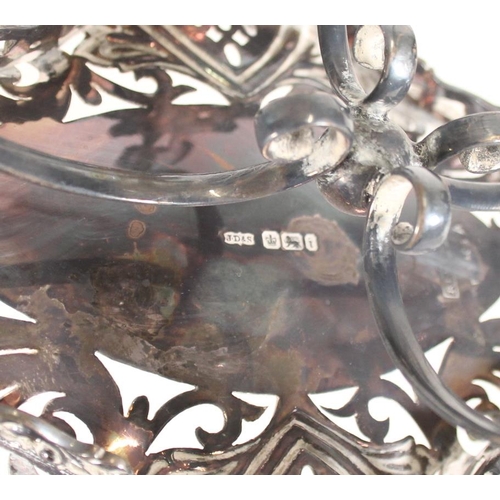 65 - Antique late Victorian or early Edwardian pierced silver basket with leaf and scroll design, raised ... 