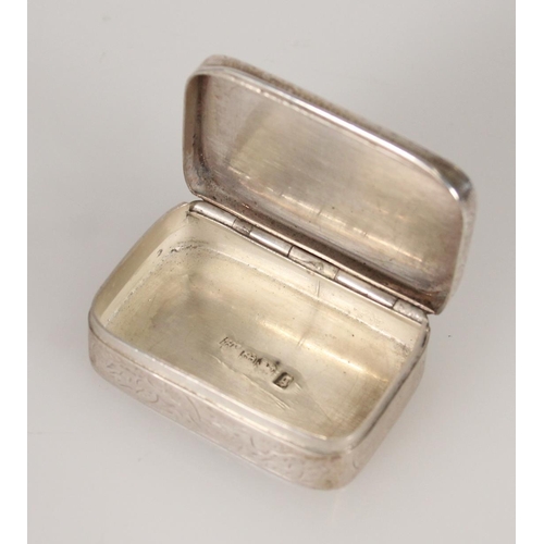 71 - Antique Victorian silver snuff box of rectangular shape having rounded corners and incised with scro... 