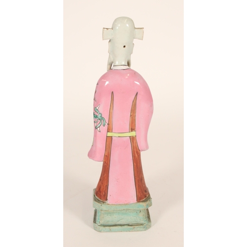 330 - Chinese Famille Rose figure of an Immortal, 19th century, the flowing robe decorated with dragon amo... 