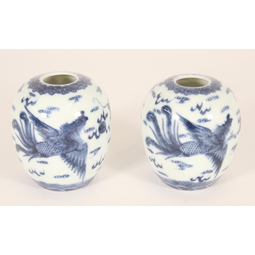 340 - Pair of Chinese porcelain dragon and phoenix vases, late Qing period, the ovoid bodies finely decora... 