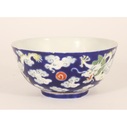 342 - Chinese white dragon bowl, late Qing period, the white dragon with green mane chasing a red flaming ... 