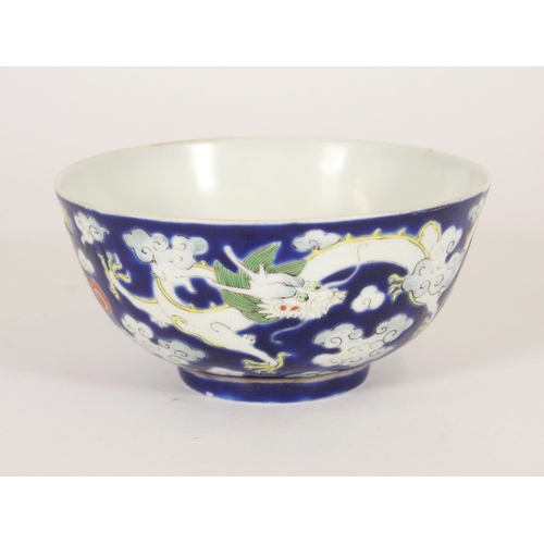 342 - Chinese white dragon bowl, late Qing period, the white dragon with green mane chasing a red flaming ... 