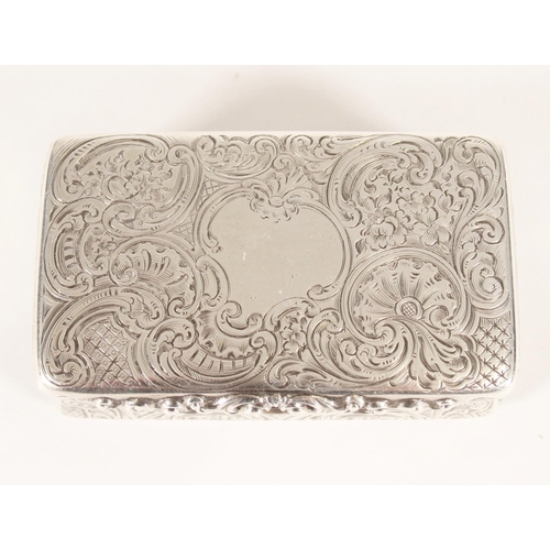 81 - Antique Victorian silver snuff box of rectangular form decorated all over with incised scroll design... 