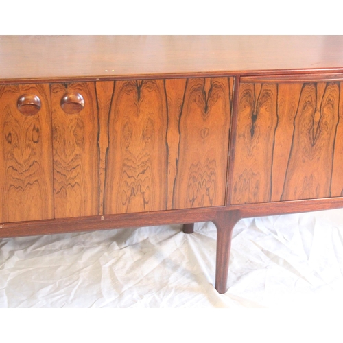 427 - A.H.McIntosh of Kirkcaldy retro sideboard with pair of cupboard doors flanked by three drawers and a... 