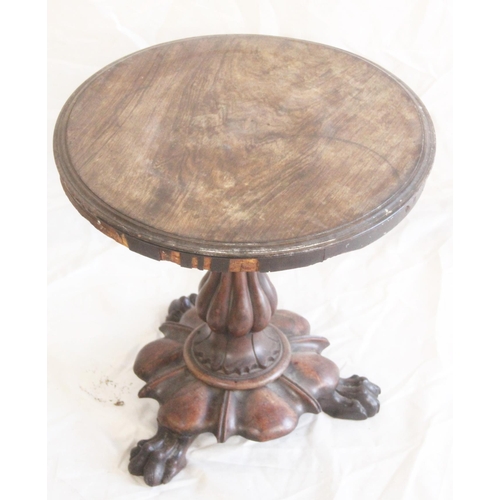 428 - Victorian mahogany round topped occasional table raised on fluted supports above three claw feet, wi... 