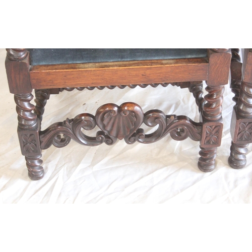 437 - Pair of antique oak open armchairs, the carved back with eagle surmounts above barley twist columns ... 