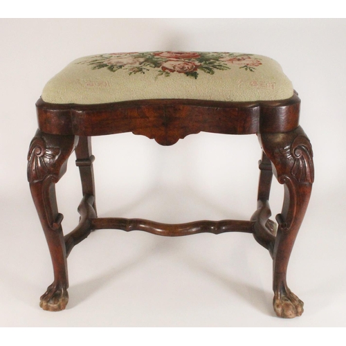 450 - Pair of antique mahogany shaped footstools raised on cabriole supports, terminating on ball and claw... 