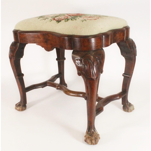 450 - Pair of antique mahogany shaped footstools raised on cabriole supports, terminating on ball and claw... 