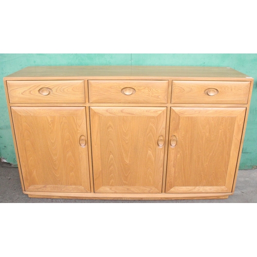 452 - Ercol Windsor 2822 sideboard with three drawers above three doors, 157cm wide x 96cm tall x 44cm dep... 