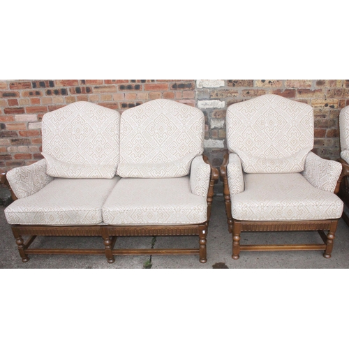 455 - Ercol Old Colonial three piece suite comprising of a three seater sofa, two seater sofa and a armcha... 