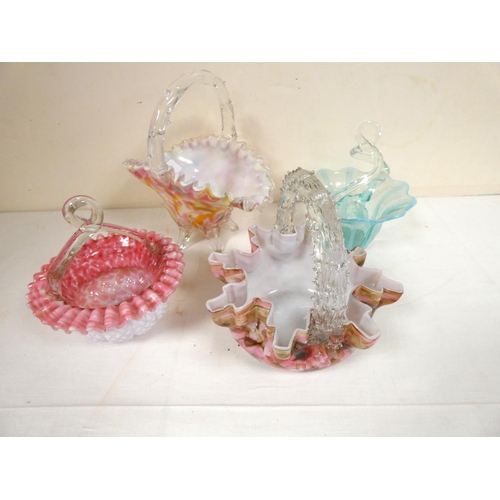 26 - Four coloured art glass posy baskets. (4)