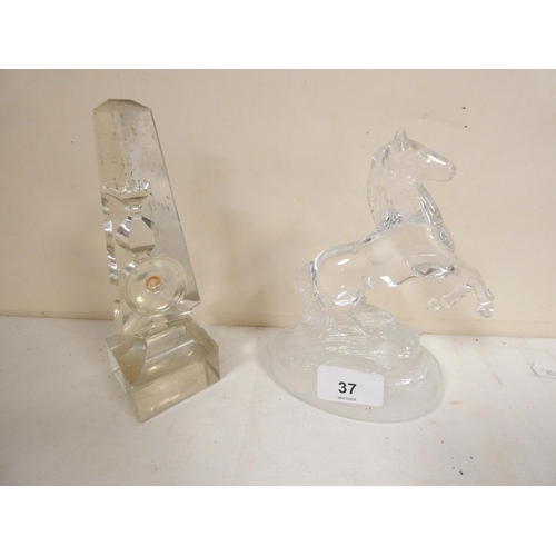 37 - Glass Rearing horse paperweight and an obelisk. (2)