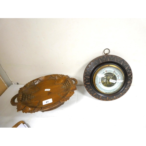 41 - Wheel barometer and a Black Forrest musical bowl with vine decoration. 29cm