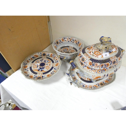 48 - Imari pattern stone china tureen on stand, a similar twin handled comport and a cake stand