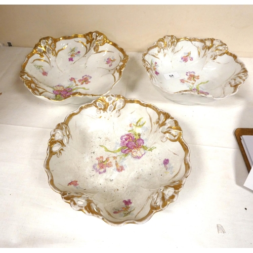 54 - Three German R & S floral and gilt decorated pierced bowls.