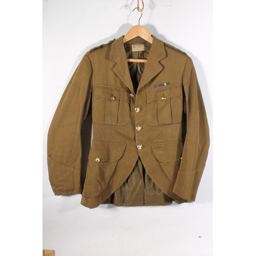 1852 - British Army uniform, five khaki green jackets to include:

Jacket with William Anderson & Sons ... 