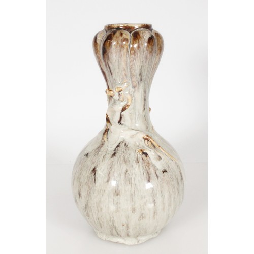 422 - Chinese style gourd shaped vase with relief dragon, having mottled grey brown drip glaze, 28cm tall.