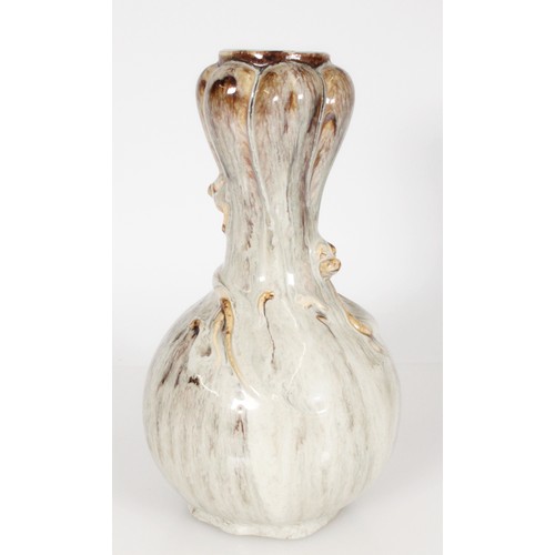 422 - Chinese style gourd shaped vase with relief dragon, having mottled grey brown drip glaze, 28cm tall.