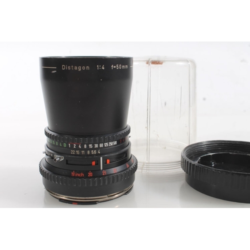 1472 - Hasselblad Carl Zeiss Distagon 1:4 f=50mm lens, serial number 5772395, held in Hasselblad plastic ca... 