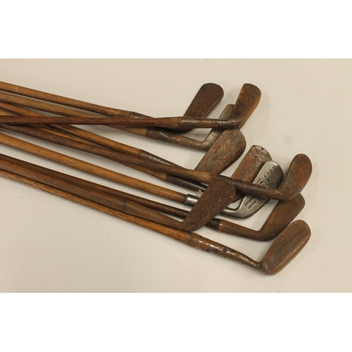 1480 - Ten hickory shafted golf clubs to include a left handed iron, a number 5 Go-Sum mashie, an Aspire Fa... 