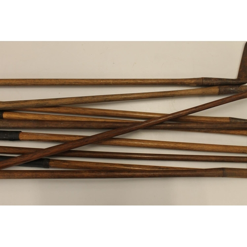 1480 - Ten hickory shafted golf clubs to include a left handed iron, a number 5 Go-Sum mashie, an Aspire Fa... 