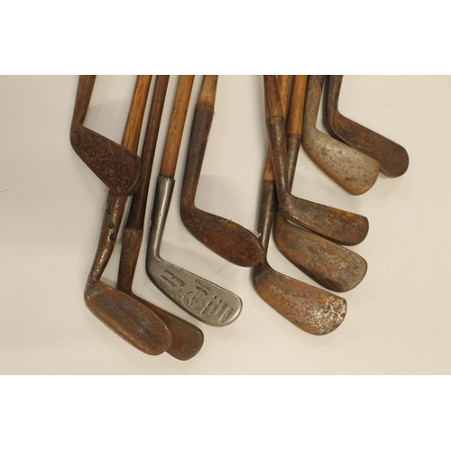 1480 - Ten hickory shafted golf clubs to include a left handed iron, a number 5 Go-Sum mashie, an Aspire Fa... 