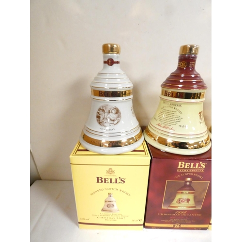 2 - Four bottles of Bell's blended Scotch whisky to include Christmas 2007, 1996, 1992 and 2006, each 40... 