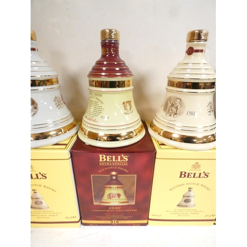 2 - Four bottles of Bell's blended Scotch whisky to include Christmas 2007, 1996, 1992 and 2006, each 40... 