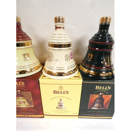 2 - Four bottles of Bell's blended Scotch whisky to include Christmas 2007, 1996, 1992 and 2006, each 40... 