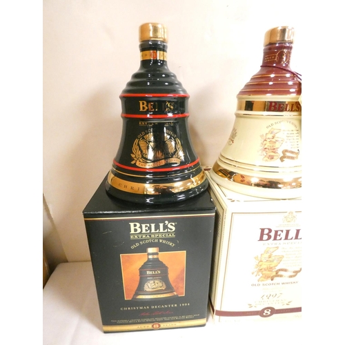 3 - Four bottles of Bell's blended Scotch whisky to include Christmas 1994, 1997, 1993 and 1995, each 40... 