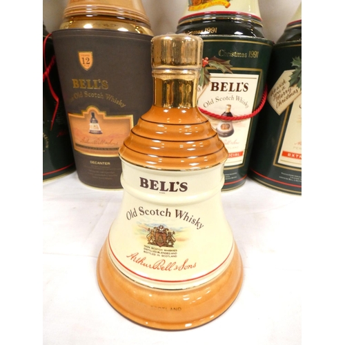 5 - Five bottles of Bell's blended Scotch whisky to include two  Christmas 1991 examples, a 1990 bo... 