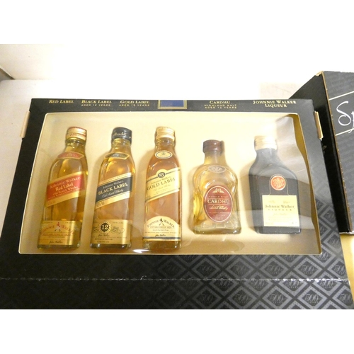 9 - Johnnie Walker. Two boxed 5cl 40% ABV whisky miniature selections to include gold label, premier and... 