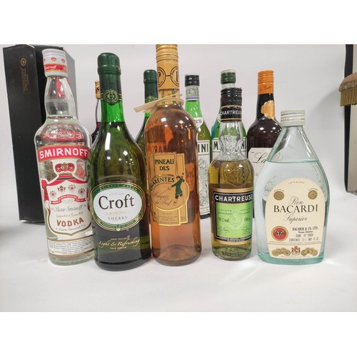 33 - Collection of Spirits and Liqueurs, to include two bottles of vodka, two bottles of Martini, Croft o... 