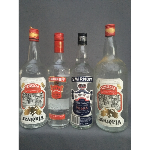 128 - Four bottles of vodka to include VLADIVAR Imperial vodka 37.5% abv. 1.125litres x2, SMIRNOFF vodka 3... 
