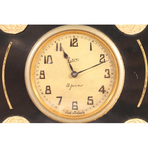 286 - French Art Deco eight day bakelite clock, c1920s, the dial signed Luc 8 jours, the black square fram... 