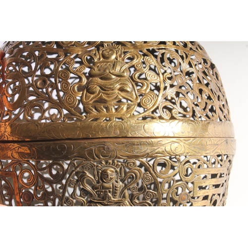 401 - Oriental large hanging incense ball, the brass ball reticulated in repeating patterns and deities, m... 