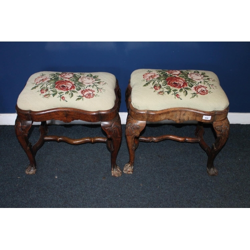 450 - Pair of antique mahogany shaped footstools raised on cabriole supports, terminating on ball and claw... 