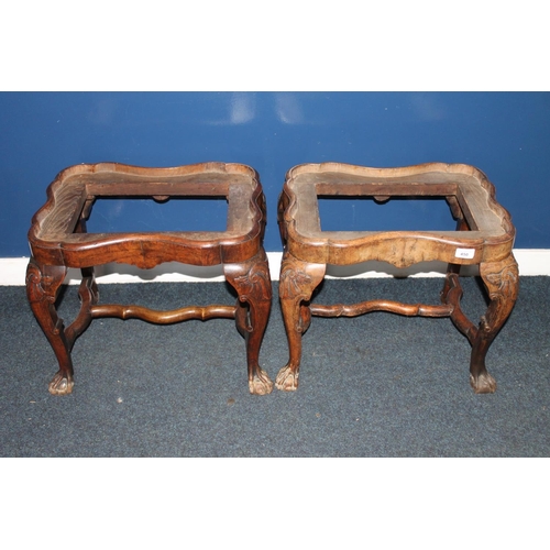 450 - Pair of antique mahogany shaped footstools raised on cabriole supports, terminating on ball and claw... 