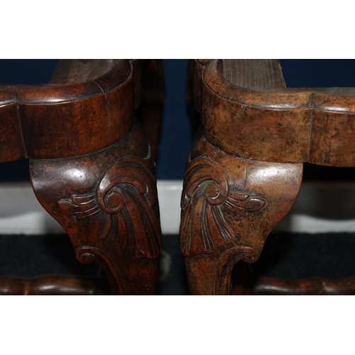 450 - Pair of antique mahogany shaped footstools raised on cabriole supports, terminating on ball and claw... 