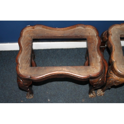 450 - Pair of antique mahogany shaped footstools raised on cabriole supports, terminating on ball and claw... 